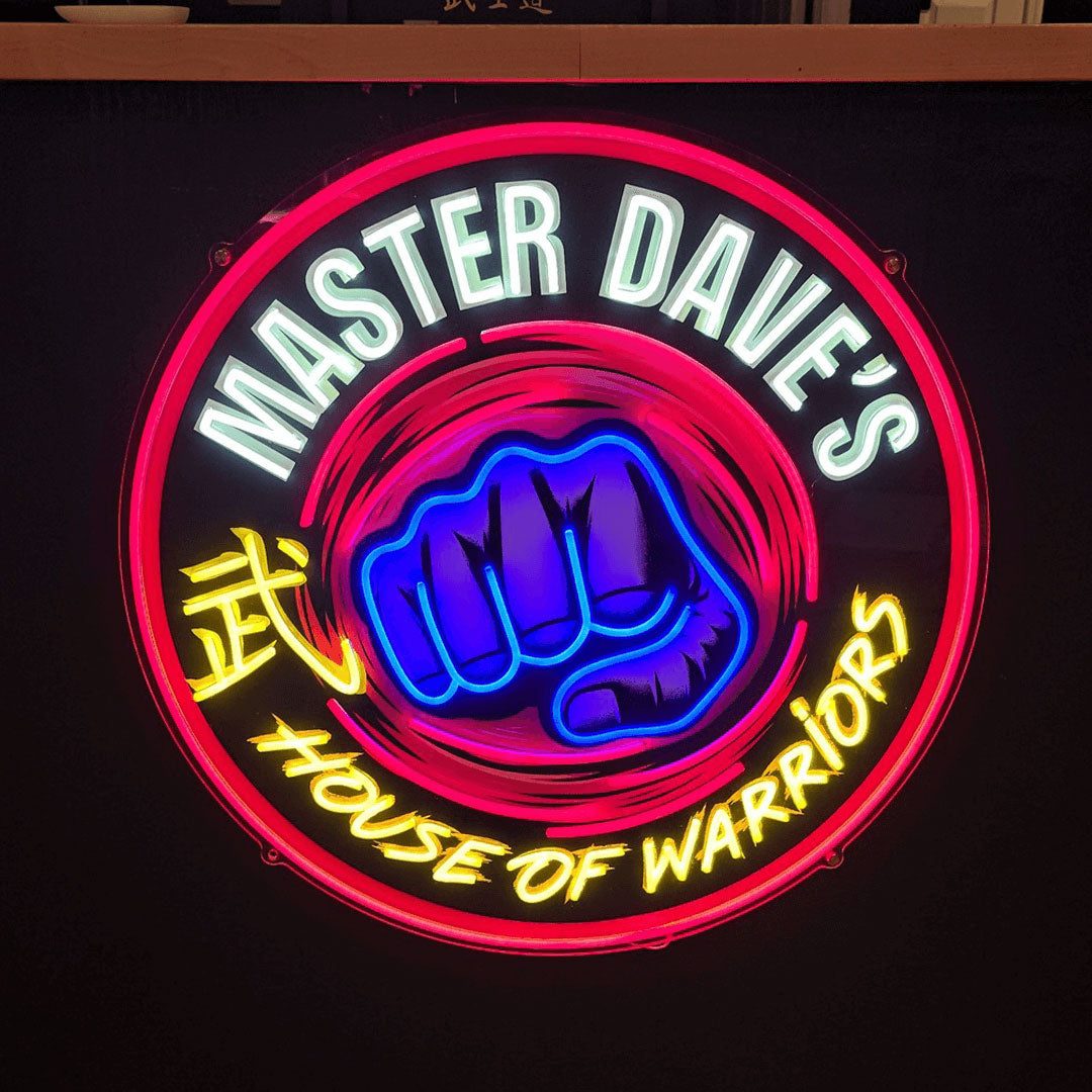 Master Dave's House of Warriors logo sign in red and chrome