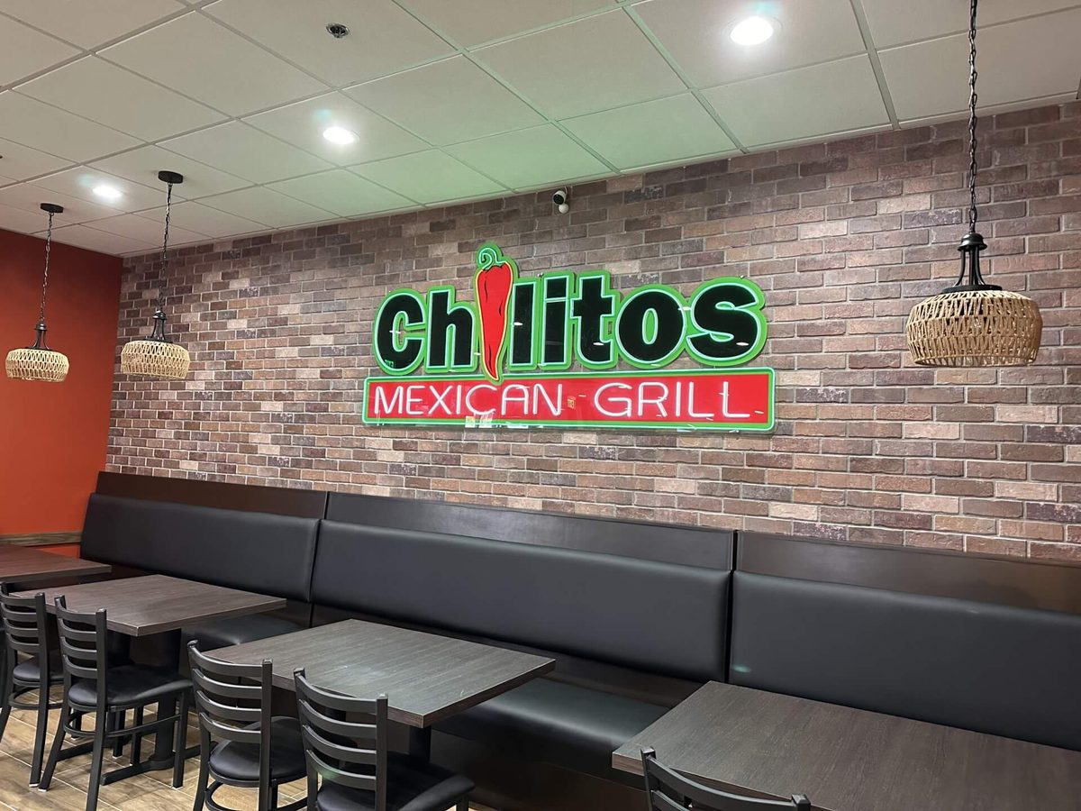 Chilitos Mexican Grill sign above a restaurant booth